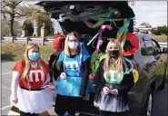  ??  ?? Great Clips staff dressed up as M&Ms.