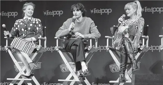  ?? ASTRID STAWIARZ Getty Images for Sony Pictures/TNS ?? From left: Carrie Coon, Finn Wolfhard and Mckenna Grace talk about the new film ‘Ghostbuste­rs: Afterlife’ at New York Comic Con.