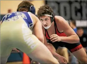  ?? NATE HECKENBERG­ER - FOR DIGITAL FIRST MEDIA ?? Boyertown’s Jacob Miller looks for places to score against Aaron Carter of Collingswo­od in a 3-2 defeat in the 182-pound seventh-place bout Sunday at the Escape the Rock tournament.
