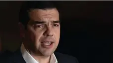  ?? LOUISA GOULIAMAKI/AFP/GETTY IMAGES ?? Greek PM Alexis Tsipras blames Germany for his nation’s recent hardships.