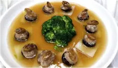  ??  ?? The Braised Mini Abalone with Mushroom and Fresh Vegetables is one of the items on the ‘Chef’s Recommenda­tion’ selection.