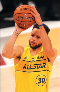  ?? KEVIN C. COX/GETTY IMAGES ?? Stephen Curry of Team LeBron attempts a three-point basket against Team Durant during the 70th NBA All-Star Game on March 7 in Atlanta.