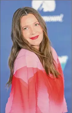  ?? Michael Loccisano / TNS ?? Drew Barrymore is set to host the MTV Movie and TV Awards. Barrymore has won three Golden Popcorns in her career.