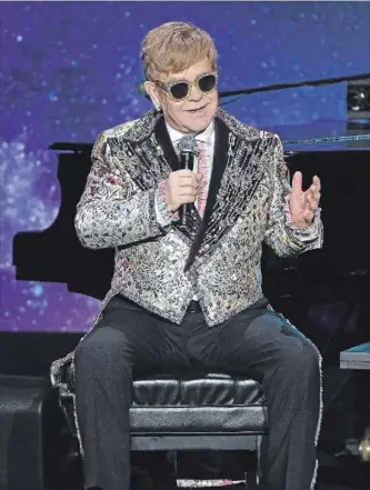  ?? DIMITRIOS KAMBOURIS GETTY IMAGES ?? Elton John will begin a final tour later this year. At 70, he says can’t do it and does not want to do it anymore.