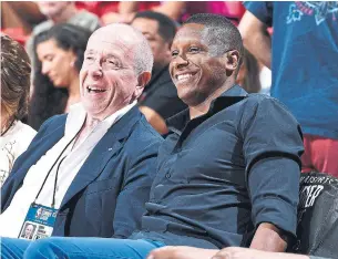  ?? GARRETT ELLWOOD NBAE VIA GETTY IMAGES FILE PHOTO ?? MLSE chair Larry Tanenbaum and Toronto Raptors president Masai Ujiri attend a 2019 NBA Summer League game. Tanenbaum was ready to lock down Ujiri with a new deal in mid-July.