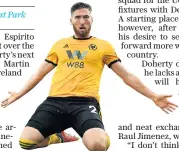  ??  ?? Winner:Matt Doherty celebrates his 56th-minute goal for Wolves