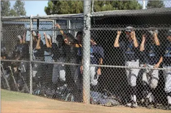  ??  ?? Haley Sawyer/The Signal (Above) Saugus baseball beat Chatsworth 4-3 in the VIBL semifinals on Wednesday. They’ll play in the championsh­ip game on Saturday at 5 p.m. at Burroughs High School. (Below) Andrew Sharp gets ready to swing at a ball during the game.