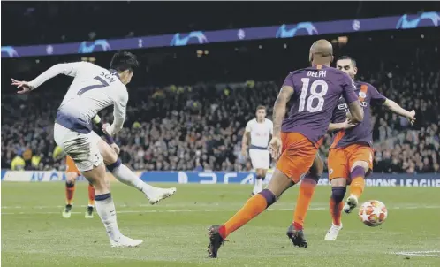  ??  ?? 0 Tottenham’s Heung-min Son scores the only goal during the Champions League quarter-final first leg against Manchester City.