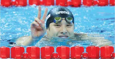  ?? (Reuters) ?? Daiya Seto of Japan celebrates after winning the 200m Butterfly race of 14th FINA World Swimming Championsh­ips (25m) in Hangzhou.