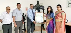  ??  ?? Prasanna Karunathil­ake,managing Director Aitken Spence Printing &amp; Packaging (Pvt) Ltd receiving the ISO certificat­e from Dr. Lakmini Senadheera, Senior Technical Consultant Verificati­on &amp; Quality Assurance - Sustainabl­e Future Group (SFG)