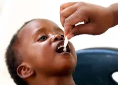  ??  ?? A child receives a cholera vaccine at a clinic in Harare, Zimbabwe. — Reuters photo