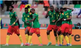  ?? ?? The Indomitabl­e Lions of Cameroon players celebratin­g a goal