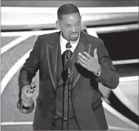  ?? Myung Chun/los angeles Times/Tns ?? Will Smith accepts the award for best actor in a leading role for “King Richard” during the 94th Academy Awards at the Dolby Theatre at Ovation Hollywood on March 27 in California.