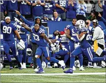  ?? MICHAEL CONROY / AP ?? Indianapol­is Colts’ Jonathan Taylor (28) runs for a touchdown during the second half of an NFL game against the New York Jets, Thursday in Indianapol­is.