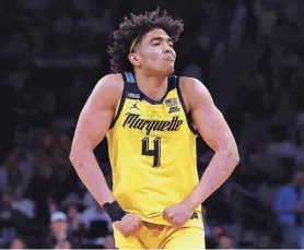  ?? SARAH STIER/GETTY IMAGES ?? Marquette guard Stevie Mitchell reacts after scoring during the second half against Villanova in a Big East quarterfinal Thursday.