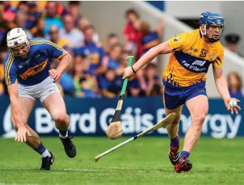  ?? DAVID FITZGERALD/ SPORTSFILE ?? Podge Collins in action against Brendan Maher during the Munster SHC match at Semple Stadium in June