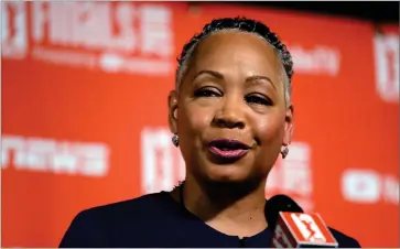  ?? AP PHOTO BY ELAINE THOMPSON ?? In this Sept. 7, 2018, file photo, then-wnba president Lisa Borders speaks before Game 1 of the WNBA basketball finals in Seattle. The U.S. Olympic and Paralympic Committee received a positive progress report from the committee that analyzed the federation’s problems and recommende­d dozens of changes a year ago. The Borders Report, spearheade­d by former WNBA Commission­er Lisa Borders and released last summer, included a detailed road map for the USOPC to make athletes the top priority after years of adhering to what was described as a “money for medals” philosophy.