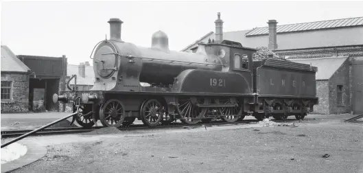  ?? V R Webster/Kiddermins­ter Railway Museum ?? Wilson Worsdell NER ‘Q’ class 4-4-0 No 1921 is seen as LNER ‘D17/2’ outside its home shed of London Road on 6 August 1933. Note the turntable pit and the table’s operating arm just visible in foreground. The shed is the north part of the double-roundhouse, and although seemingly not in steam, the 4-4-0 appears to be coaled up and ready to resume service on the Monday morning. Classmate No 1876 was noted by the photograph­er as departing Carlisle on the 6.57am service to Newcastle on this day, which must have been around the time the refreshmen­t rooms opened, an essential visit prior to visiting five engine sheds! The pictured engine finally departed the London Road records with No 1876 in September 1942, bound for different ends of Edinburgh, and each just seven months away from being condemned.