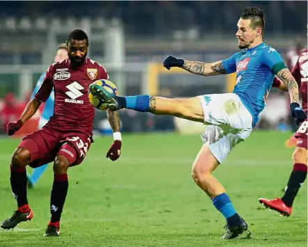  ?? — Reuters ?? Back in the groove: Napoli’s Marek Hamsik trying to control the ball during their Serie A match against Torino in Turin on Saturday.