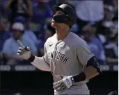  ?? CHARLIE RIEDEL — THE ASSOCIATED PRESS ?? The New York Yankees' Aaron Judge celebrates as he crosses the plate after hitting a solo home run during the ninth inning Sunday against the Kansas City Royals in Kansas City, Mo. The Yankees won 6-4.