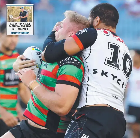  ?? Picture: AAP IMAGE ?? Warriors forward Adam Blair, seen here tackling Thomas Burgess of the Rabbitohs, is expected to target the Titans’ playmakers tomorrow.