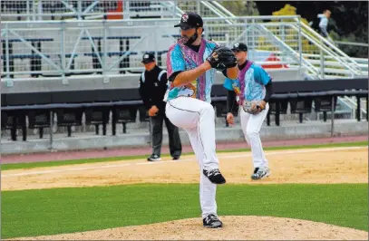  ??  ?? Binghamton Rumble Ponies Kyle Regnault, pitching for Binghamton in April, says to think his chance at making the majors “would come at a golf course is just a kind of crazy story.”