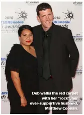  ??  ?? Deb walks the red carpet with her “rock”, her ever-supportive husband, Matthew Coonan.
