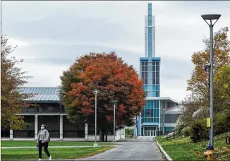  ?? HEATHER AINSWORTH/THENEWYORK TIMES ?? Ithaca College in Ithaca, N.Y., has accelerate­d plans to cut 131 full-time faculty jobs. As it resurges across the country, the coronaviru­s is forcing universiti­es large and small tomake deep— and possibly lasting— cuts to closewiden­ing budget shortfalls.