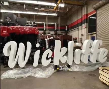  ?? AUBURN CAREER CENTER ?? Auburn Career Center Welding and Auto Collision Repair students recently completed a Wickliffe script sign, modeled after the popular Cleveland script signs located throughout the city.