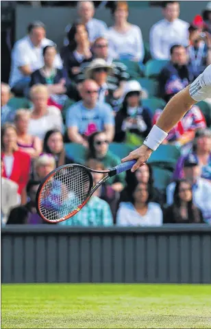  ?? Picture: Getty Sport ?? RECOVERY: Andy Murray darts across court to swipe a forehand shot back at Bautista Agut.