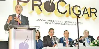  ?? RICARDO FLETE ?? El ministro Peralta durante su disertació­n en Santiago.