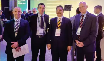  ?? ?? Dr Hazland (second right) in a group photo with Baker Hughes vice presidents Ahmed Eldemerdas­h (left) and Alejandro Duran (second left) at the Baker Hughes Energy Conference and Annual Meeting.