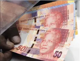  ?? P
: B ?? The rand weakened with most major and emerging market currencies yesterday.
