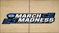  ?? PAUL SANCYA — THE ASSOCIATED PRESS ?? The March Madness logo is shown on the court March 20 in Indianapol­is.