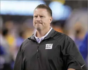  ?? THE ASSOCIATED PRESS — BILL KOSTROUN ?? After two losses to open the season, coach Ben McAdoo will be feeling the pressure as his Giants venture into Lincoln Financial Field to take on the Eagles Sunday afternoon.