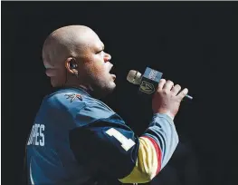 ??  ?? Johnson sings the national anthem before Game 2 of the Stanley Cup Final. Golden Knights officials says Johnson will be back multiple times in the 2018-19 season.
