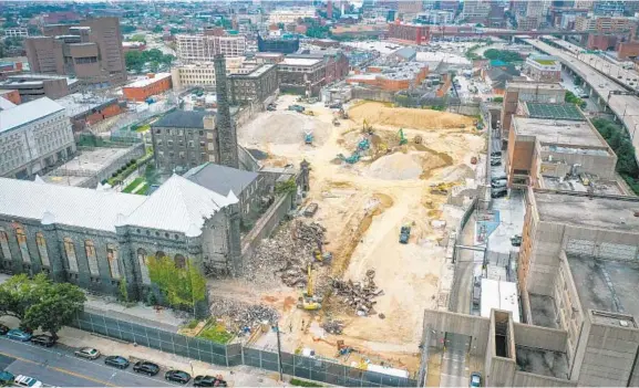  ?? JERRY JACKSON/BALTIMORE SUN ?? Wrecking crews have opened up the historic west wing of the old Maryland Penitentia­ry. The notorious state prison that traces to 1811 is being demolished.