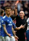  ??  ?? ALL GOING OFF: Mike Dean gives Joe Ralls a straight red