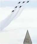  ?? SUSAN WALSH/AP ?? The U.S. Navy’s Blue Angels soar over the Washington Monument on July 4.