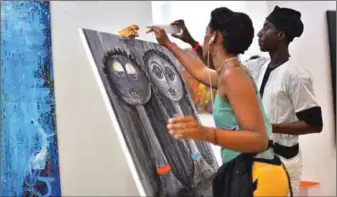  ??  ?? Live painting at Art X Lagos