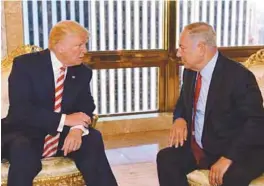  ??  ?? Trump speaking to Netanyahu during their meeting in New York last year.