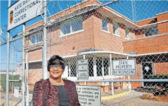  ?? [SARAH PHIPPS/ THE OKLAHOMAN] ?? Donna Thompson, president of the Oklahoma Baptist State Convention Prison Ministry, stands outside Kate Barnard Correction­al Center, site of a future ministry drop-off event.