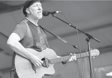  ?? DAVE MARTIN/AP ?? Richard Thompson at the 2008 New Orleans Jazz & Heritage Festival at the New Orleans Fairground­s Racetrack. Thompson cowrote “Beeswing” with Scott Timberg.
