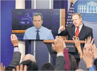  ?? CHIP SOMODEVILL­A, GETTY IMAGES ?? White House spokesman Sean Spicer takes questions from reporters in the Brady Press Briefing Room after answering a question from WMUR’s Josh McElveen via Skype.