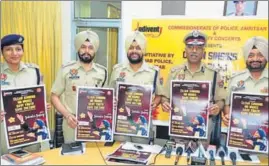  ??  ?? (From left) DCP Amrik Singh Powar; Amritsar police commission­er SS Srivastava; ADCP City2, Lakhbir Singh; ADCP City1, Jagjit Singh Walia and ACP Licensing for Amritsar City, Parvinder Kaur, releasing a poster of Punjabi sufi singer Satinder Sartaj’s...