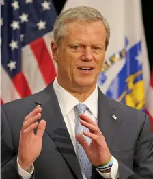  ?? Stuart Cahill / hErald StaFF ?? DON’T STOP NOW: Gov. Charlie Baker encouraged people in the state to keep wearing masks in public, as the top way of limiting the coronaviru­s.