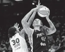  ?? Rick Scuteri / Associated Press ?? Mercury center Brittney Griner, right, was too much for Azura Stevens or any other Sky player to handle Wednesday night.