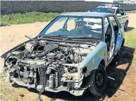  ?? Picture:Picture: CAPS Picture: SAPS ?? KEYWORD: Then .... BARE SHELL: This stripped Toyota Tazz was one of seven vehicles hijacked