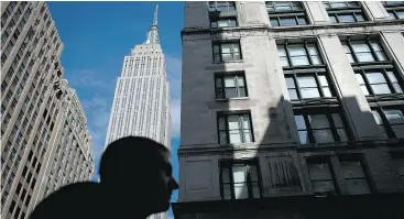  ?? SCOTT EELLS / BLOOMBERG ?? The owners of New York City’s iconic Empire State Building are searching for tenants to fill about 50,000 square feet (4,600 square metres) of retail space.