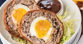  ?? ?? Cracking: Scotch eggs are substantia­l meals... but only if there’s table service
